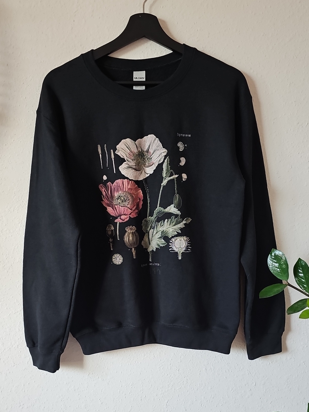 Black Crewneck Sweater with Botanical Poppy Print